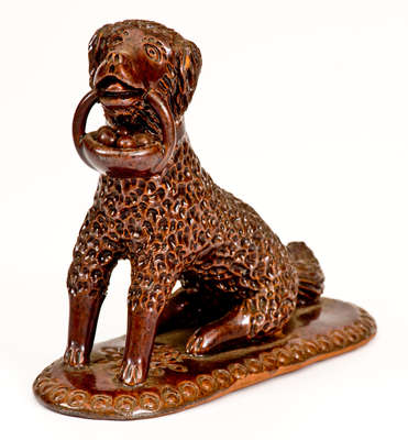 Glazed Redware Figure of a Dog with Basket, PA origin