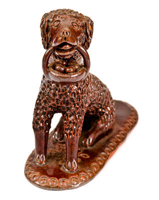 Pennsylvania Redware Figure of a Dog w/ Basket, circa 1850-1880