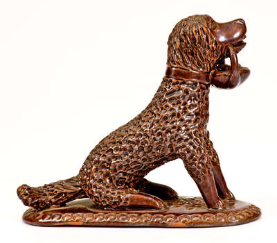 Pennsylvania Redware Figure of a Dog w/ Basket, circa 1850-1880