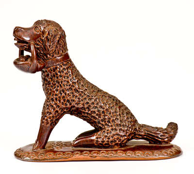 Pennsylvania Redware Figure of a Dog w/ Basket, circa 1850-1880