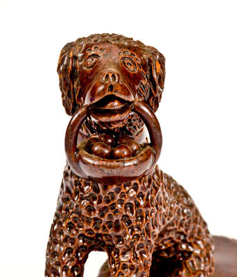 Pennsylvania Redware Figure of a Dog w/ Basket, circa 1850-1880