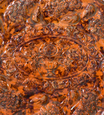 JOHN BELL / WAYNESBORO Redware Trivet with Urn and Grapes Motif