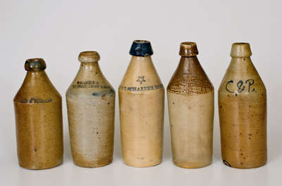 Lot of Five: Fine Stoneware Bottles incl. Dated and Cobalt Decorated Examples