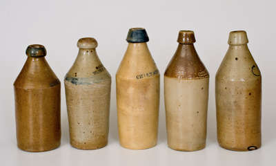 Lot of Five: Fine Stoneware Bottles incl. Dated and Cobalt Decorated Examples