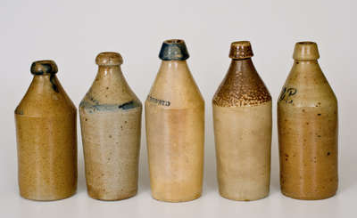 Lot of Five: Fine Stoneware Bottles incl. Dated and Cobalt Decorated Examples