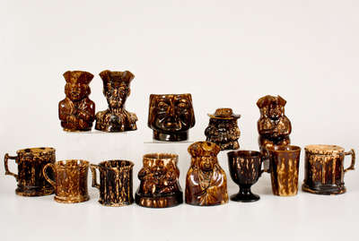 Lot of Thirteen: Rockingham Ware Cups and Molded Figural Vessels