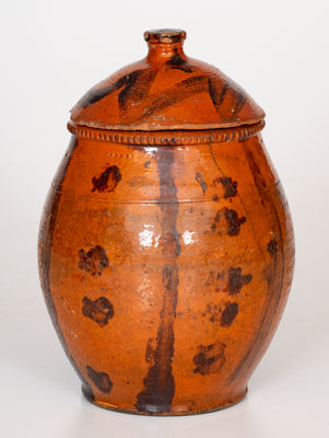 Scarce Lidded Redware Jar with Folky Manganese Decoration, probably Pennsylvania