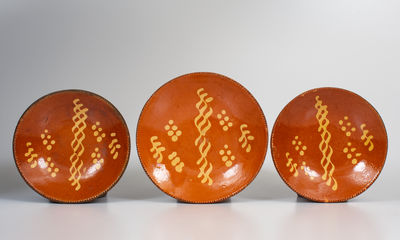 Rare Set of Three Pennsylvania or NJ Slip-Decorated Redware Plates