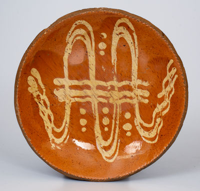 Fine Slip-Decorated Pennsylvania Redware Plate, first quarter 19th century