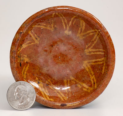 Fine Miniature Slip-Decorated Pennsylvania Redware Dish, 19th century