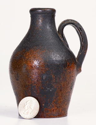 Fine Small-Sized North Carolina Moravian Redware Jug, late 18th / early 19th century