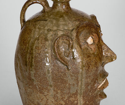 Exceedingly Rare and Important Alkaline-Glazed Stoneware Face Jug, Edgefield District, SC, c1850-1880