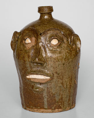 Exceedingly Rare and Important Alkaline-Glazed Stoneware Face Jug, Edgefield District, SC, c1850-1880