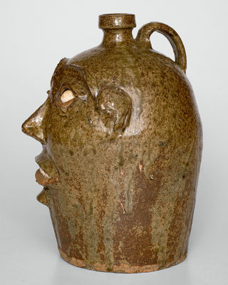 Exceedingly Rare and Important Alkaline-Glazed Stoneware Face Jug, Edgefield District, SC, c1850-1880