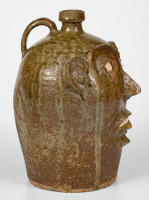 Exceedingly Rare and Important Alkaline-Glazed Stoneware Face Jug, Edgefield District, SC, c1850-1880