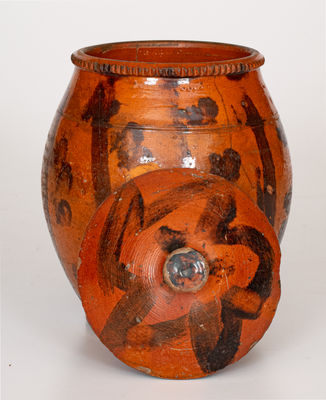 Scarce Lidded Redware Jar with Folky Manganese Decoration, probably Pennsylvania