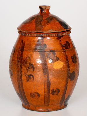 Scarce Lidded Redware Jar with Folky Manganese Decoration, probably Pennsylvania