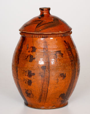 Scarce Lidded Redware Jar with Folky Manganese Decoration, probably Pennsylvania