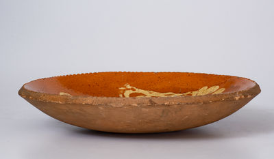 Fine Slip-Decorated Pennsylvania Redware Plate, first quarter 19th century