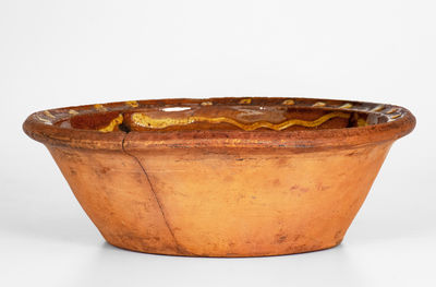 Glazed Redware Bowl w/ Two-Color Slip Decoration, probably Pennsylvania, 19th century