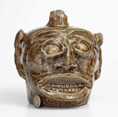 Rare and Important Edgefield District, SC Stoneware Face Harvest Jug w/ Elaborate Hand-Modeled Features