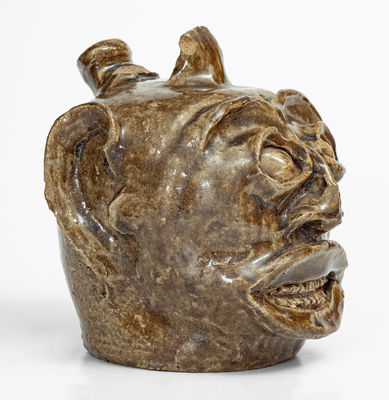 Rare and Important Edgefield District, SC Stoneware Face Harvest Jug w/ Elaborate Hand-Modeled Features