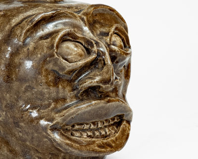 Rare and Important Edgefield District, SC Stoneware Face Harvest Jug w/ Elaborate Hand-Modeled Features