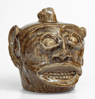 Rare and Important Edgefield District, SC Stoneware Face Harvest Jug w/ Elaborate Hand-Modeled Features