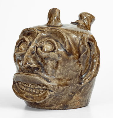 Rare and Important Edgefield District, SC Stoneware Face Harvest Jug w/ Elaborate Hand-Modeled Features