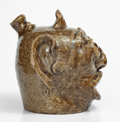 Rare and Important Edgefield District, SC Stoneware Face Harvest Jug w/ Elaborate Hand-Modeled Features