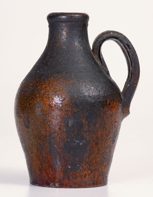 Fine Small-Sized North Carolina Moravian Redware Jug, late 18th / early 19th century