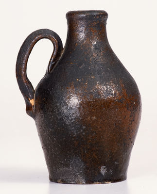 Fine Small-Sized North Carolina Moravian Redware Jug, late 18th / early 19th century