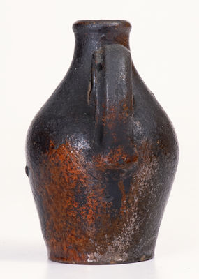 Fine Small-Sized North Carolina Moravian Redware Jug, late 18th / early 19th century