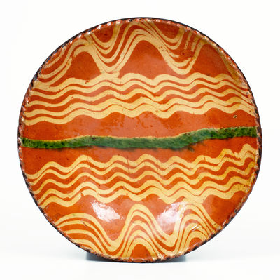 Fine Philadelphia Slip-Decorated Redware Plate, late 18th / early 19th century