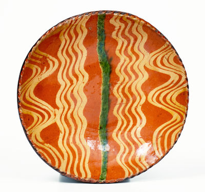 Fine Philadelphia Slip-Decorated Redware Plate, late 18th / early 19th century