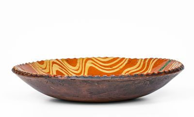 Fine Philadelphia Slip-Decorated Redware Plate, late 18th / early 19th century