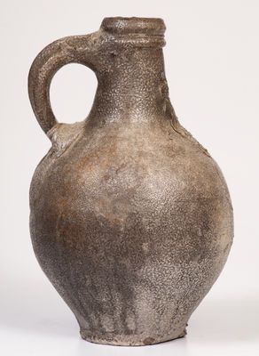 Small-Sized Bellarmine Stoneware Jug, probably Frechen, Germany, 16th or 17th century