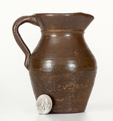 Miniature Albany Slip Glazed Stoneware Pitcher Inscribed