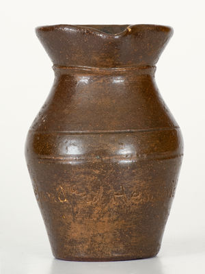 Miniature Albany Slip Glazed Stoneware Pitcher Inscribed