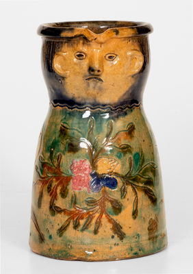 Elaborate Earthenware Face Pitcher, European origin