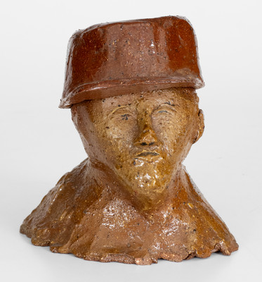 Rare Two-Piece Sewer Tile Bust Sculpture of a Hatted Man, probably Ohio, late 19th / early 20th century