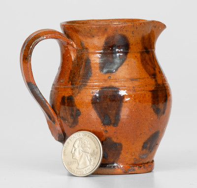 Fine Miniature Redware Pitcher with Profuse Manganese Decoration