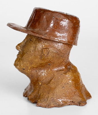 Rare Two-Piece Sewer Tile Bust Sculpture of a Hatted Man, probably Ohio, late 19th / early 20th century