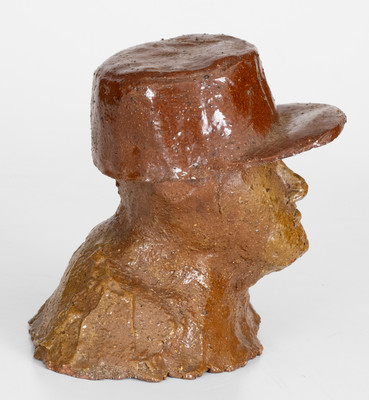 Rare Two-Piece Sewer Tile Bust Sculpture of a Hatted Man, probably Ohio, late 19th / early 20th century