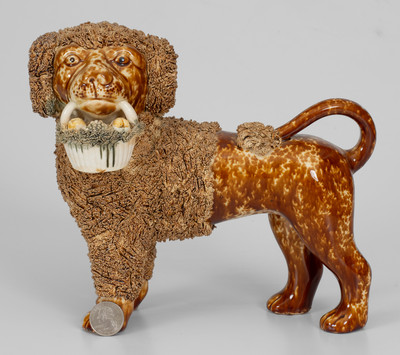 Flint Enamel Figure of a Dog w/ Basket, attrib. Lyman, Fenton & Co., Bennington, VT, circa 1849-1852