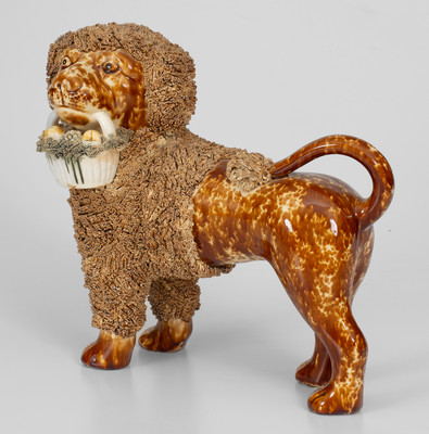 Flint Enamel Figure of a Dog w/ Basket, attrib. Lyman, Fenton & Co., Bennington, VT, circa 1849-1852