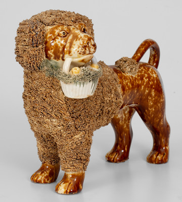 Flint Enamel Figure of a Dog w/ Basket, attrib. Lyman, Fenton & Co., Bennington, VT, circa 1849-1852