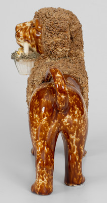 Flint Enamel Figure of a Dog w/ Basket, attrib. Lyman, Fenton & Co., Bennington, VT, circa 1849-1852