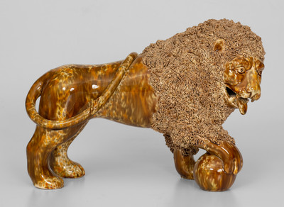 Flint Enamel Figure of a Lion, attributed to Lyman, Fenton & Co., Bennington, VT, circa 1849-1852.