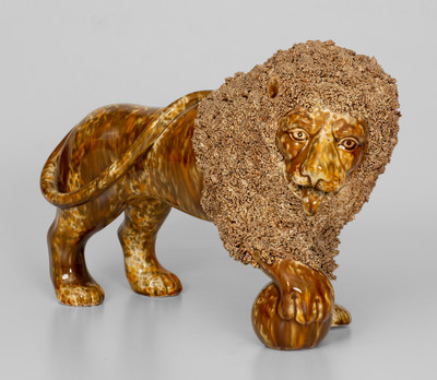 Flint Enamel Figure of a Lion, attributed to Lyman, Fenton & Co., Bennington, VT, circa 1849-1852.